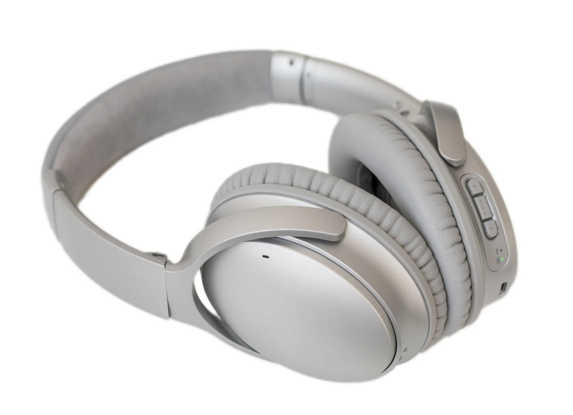 Studio-grade over-ear headphones resting on a dark surface