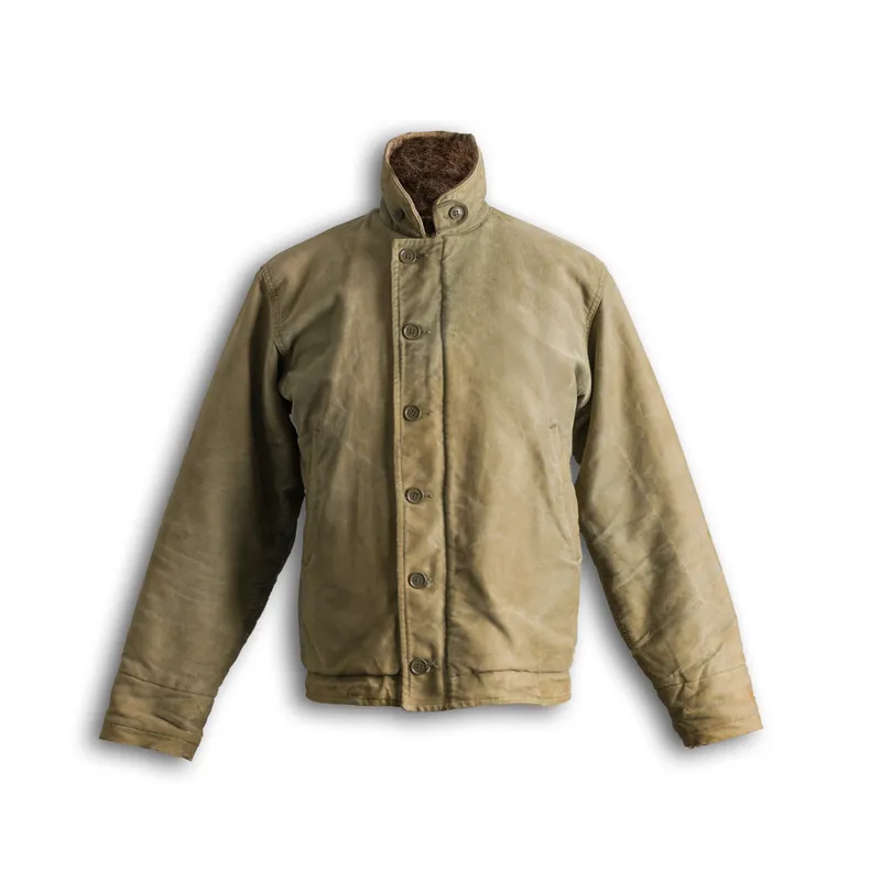 Waxed Field Jacket in tan waxed canvas with a fleece-lined collar, shown flat