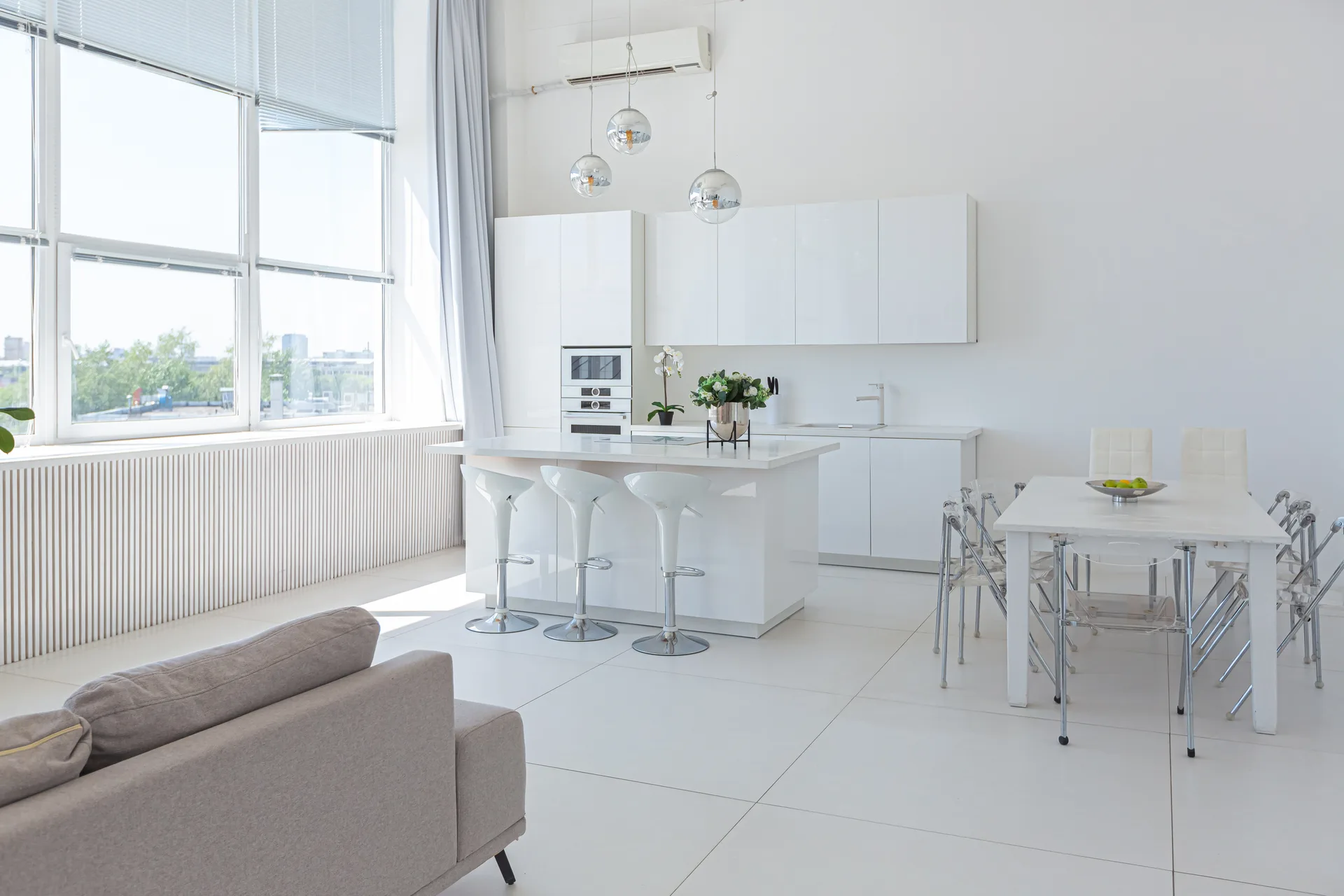 Pro deep-cleaning baseboards in a renovated room