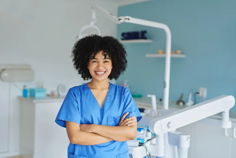 Portrait of Dr. Priya Nair, restorative specialist at Meridian