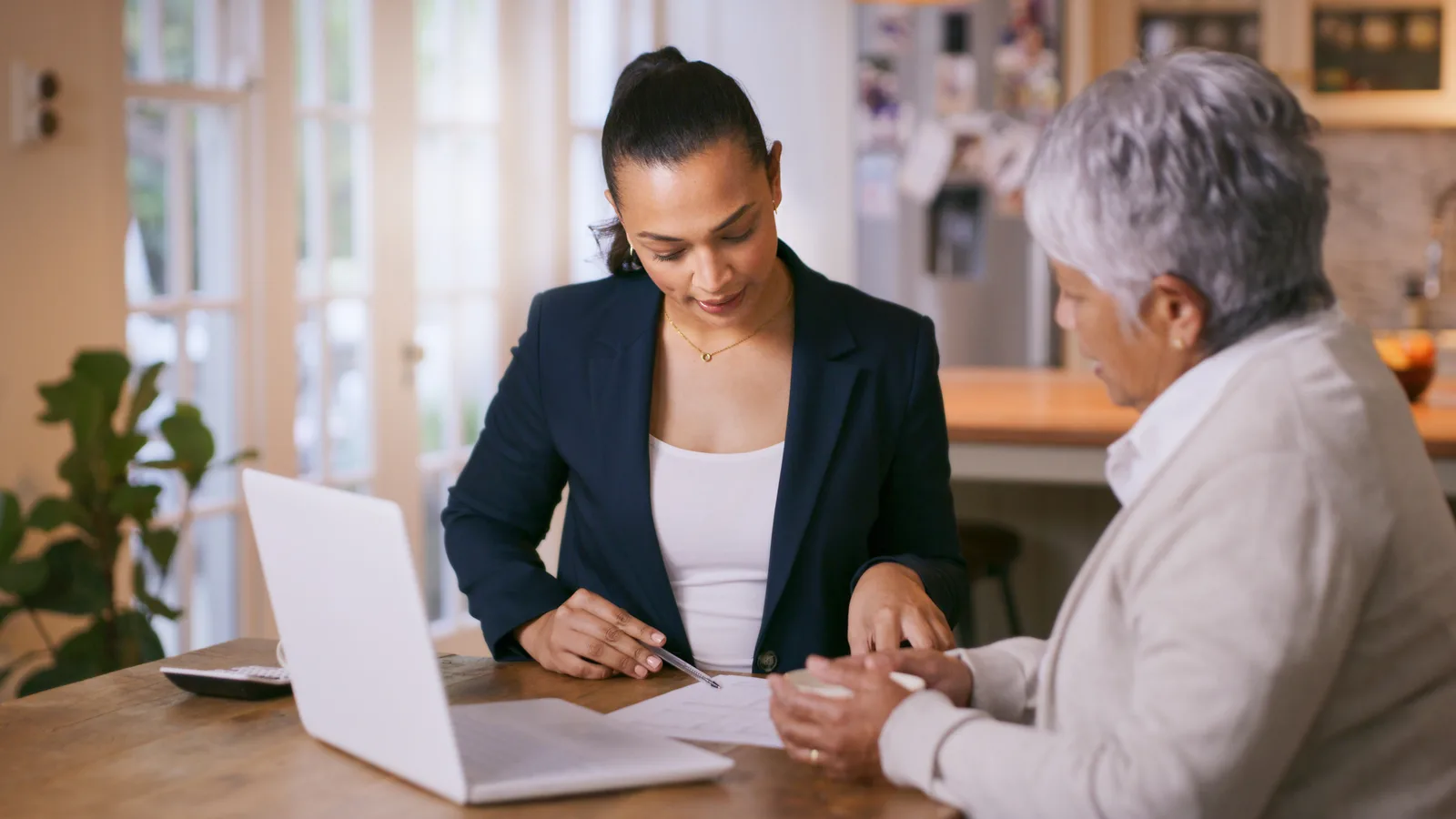 Advisor reviewing a credit report with a client