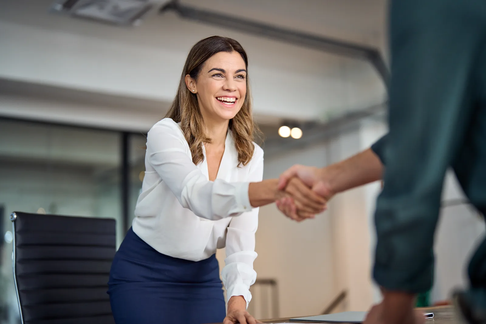 Employment lawyer meeting with a client in an office