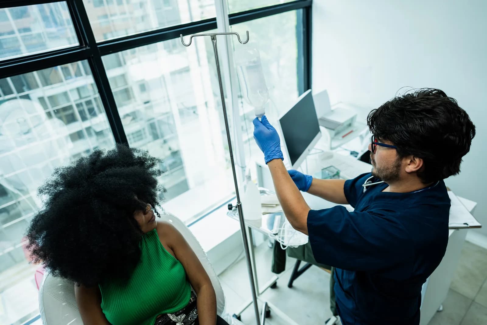 Patient receiving an IV drip at a wellness clinic