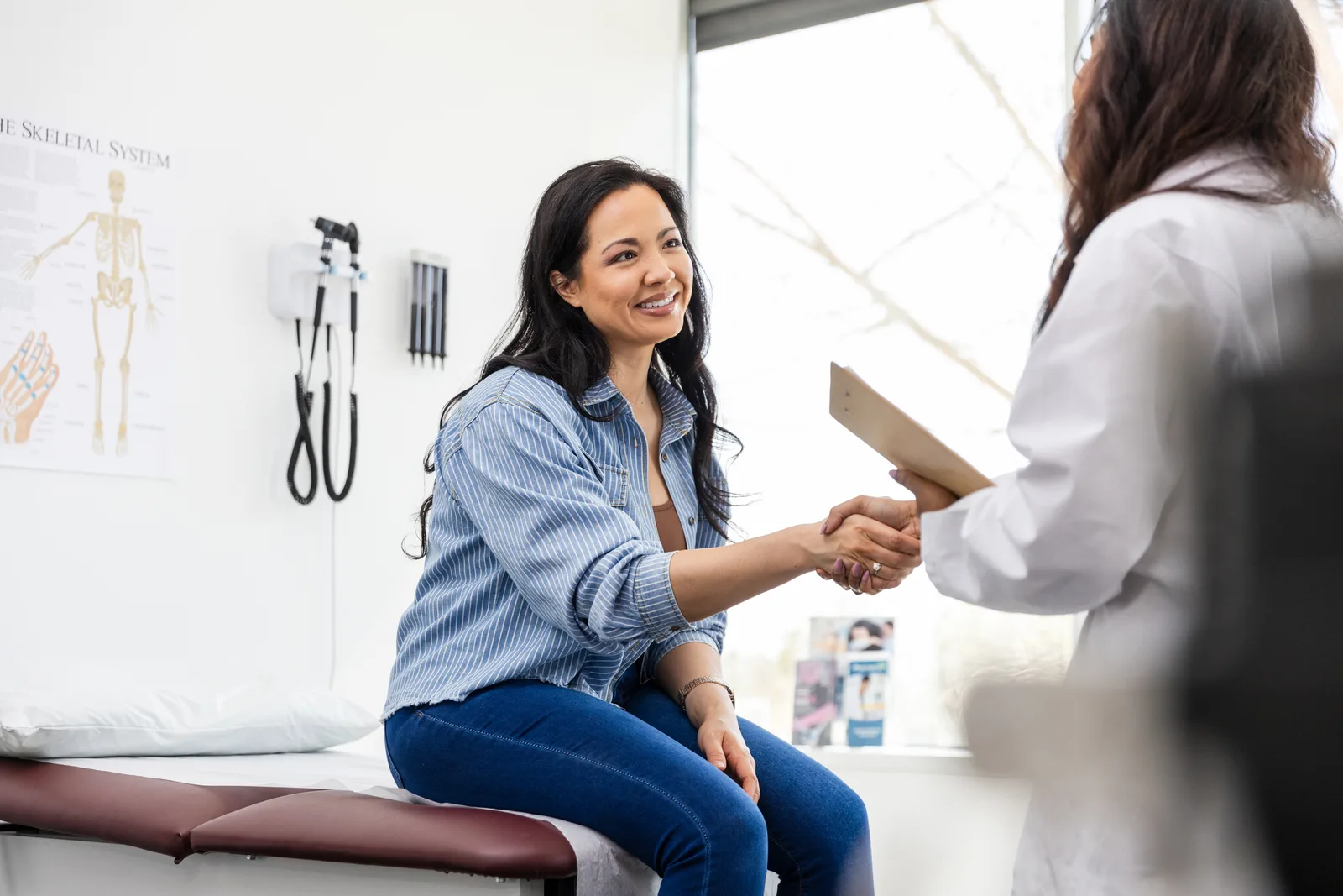 Doctor greeting a patient at an urgent care clinic