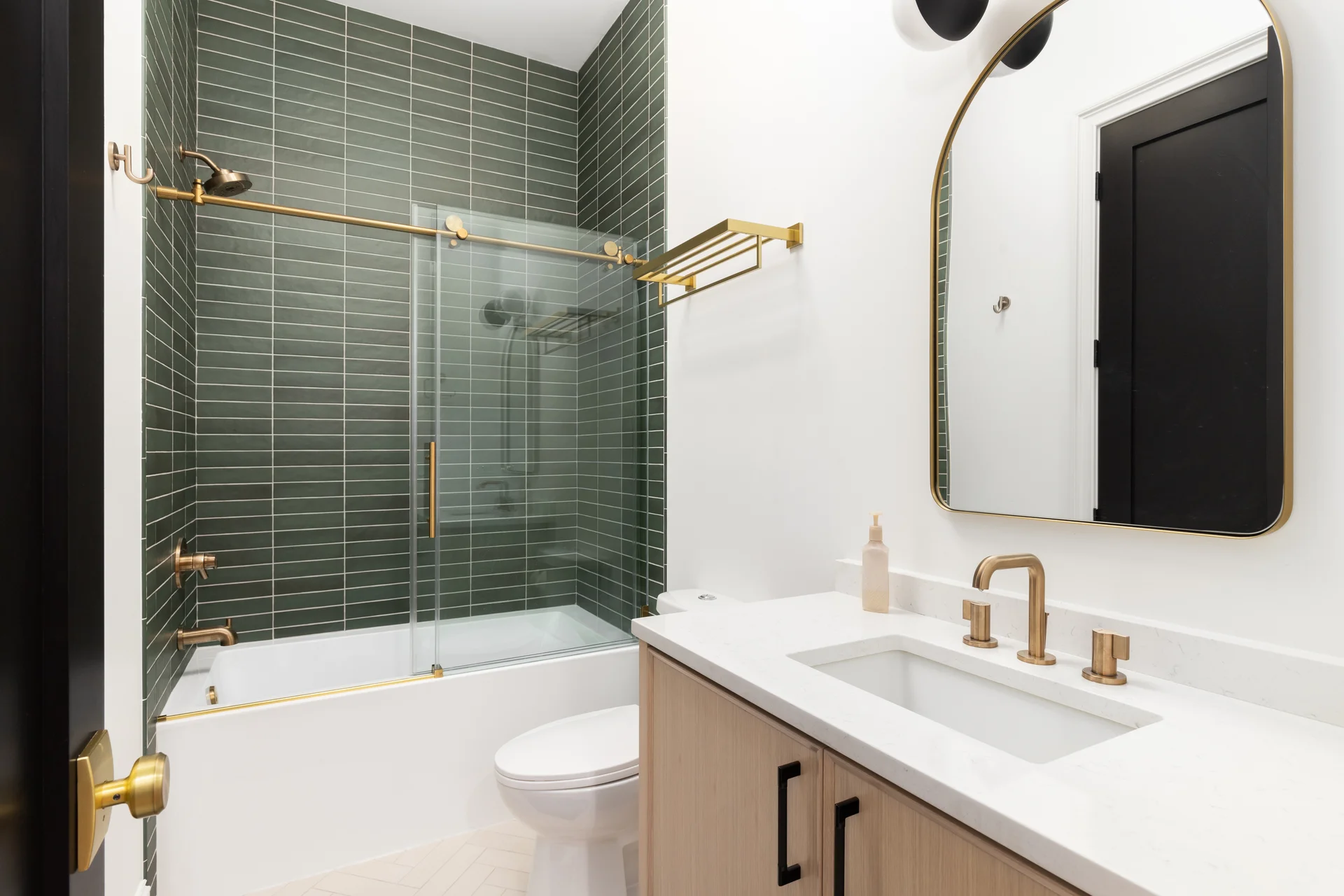 Luxury bathroom interior with gold accents and marble