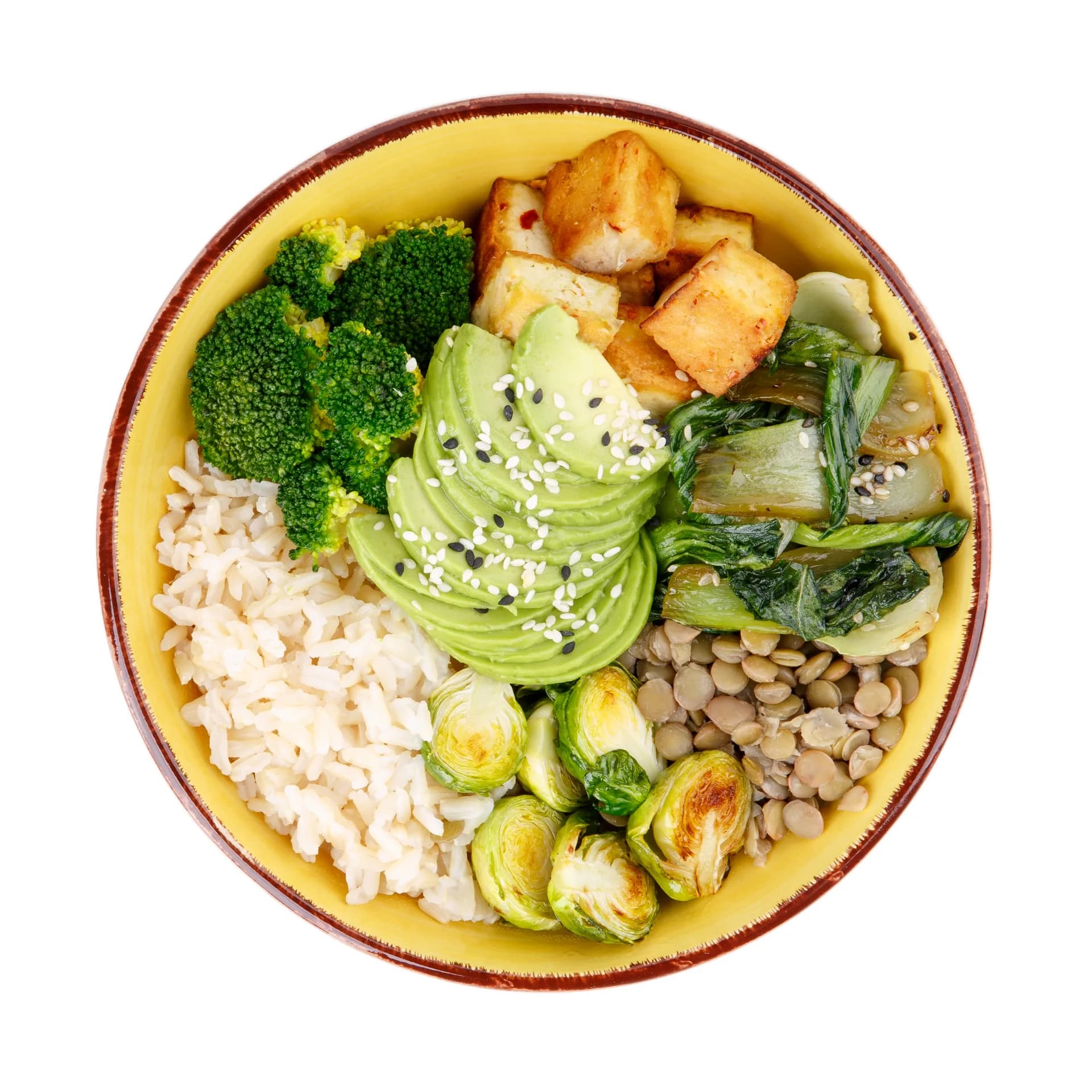Top-down grain bowl with chicken and greens