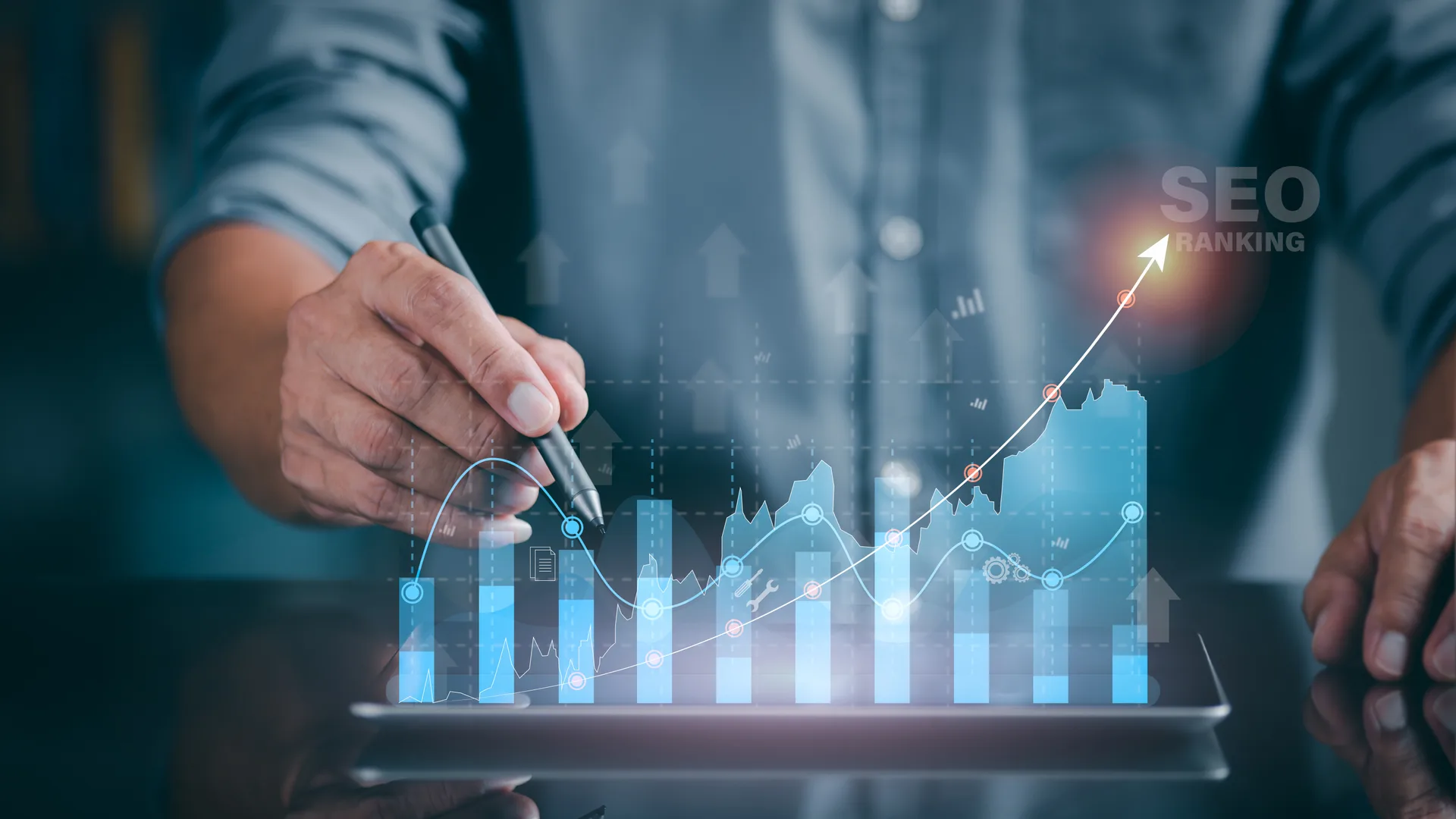 SEO specialist reviewing keyword rankings, organic traffic data, and search visibility metrics on a multi-monitor analytics dashboard